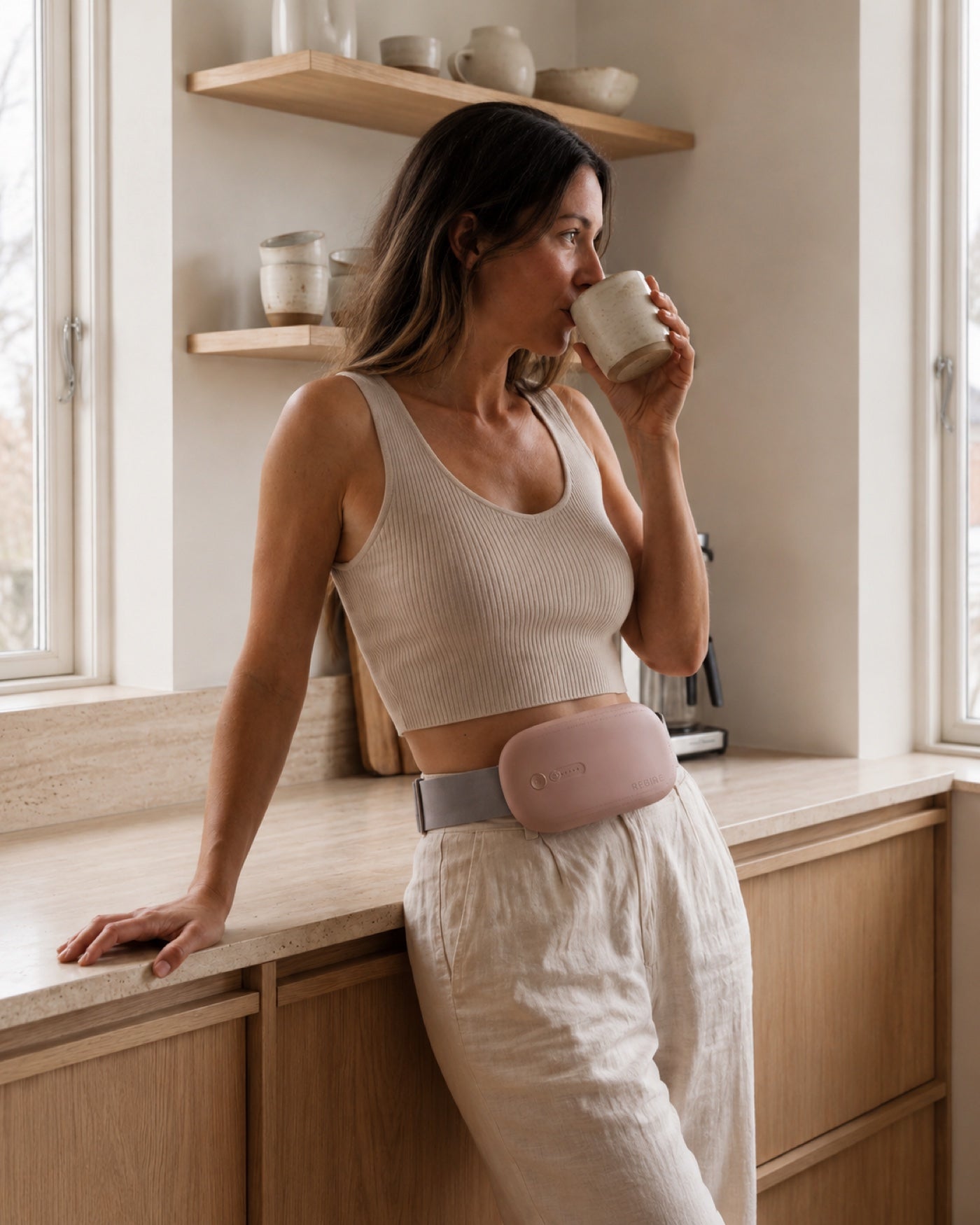 The Rebire belt photographed in the studio, contact panel visible