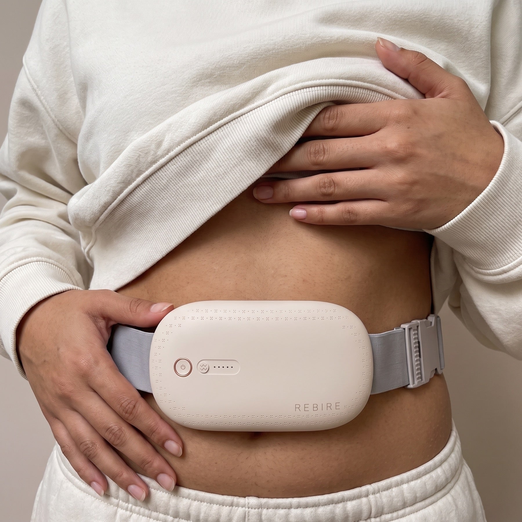 The NuFemme belt worn against the skin